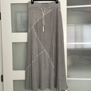 Poetry paneled hemp/cotton skirt. Maxi length. Elasticated waist band. Size 6